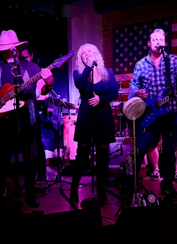 The Straight A’s full band performing for a live crowd